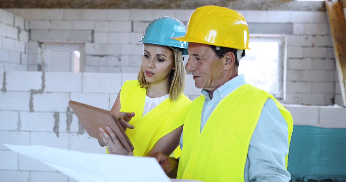 Building industry workers using online software on-site